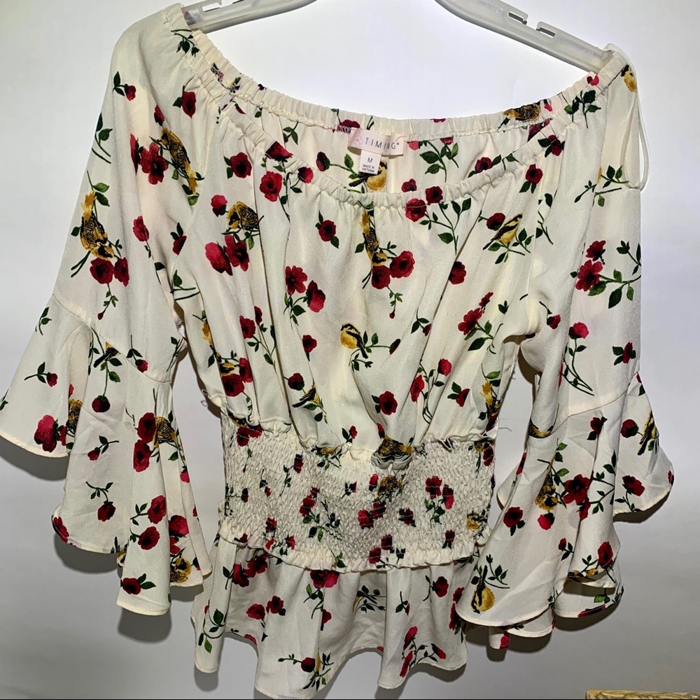 Floral white shirt with bell sleeves